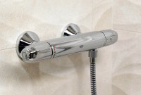 Термостатический смеситель Grohe Grohtherm 1000 34151004 с душевым гарнитуром