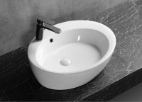 Накладная раковина Ceruttispa CR7026A 60 глянцевая белая, овальная